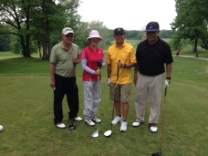Charlie with golfers